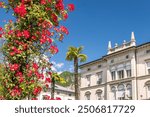 Flowers on a street in the Riva del Garda, town on the shores of Lake Garda, Italy, Europe.