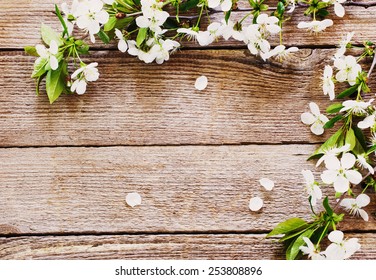 flowers on wooden background - Shutterstock ID 253808896