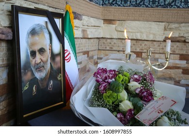 Flowers And Poster Of Iranian General Qasem Soleimani Are Pictured At The Table Of Condolence Outside The Iranian Embasy In Kuala Lumpur January 8, 2020.