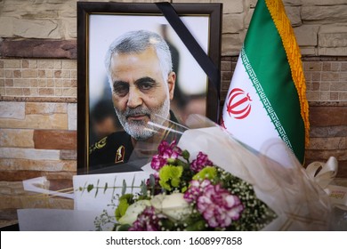 Flowers And Poster Of Iranian General Qasem Soleimani Are Pictured At The Table Of Condolence Outside The Iranian Embasy In Kuala Lumpur January 8, 2020.