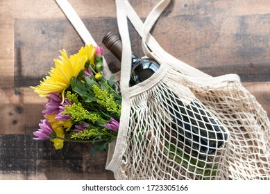 Flowers And Wine In A Reusable Cotton Macrame Bag For Mother's Day