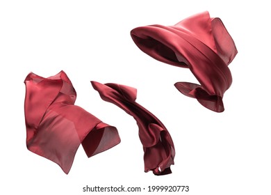 Flowing red silk scarf isolated on white background. 