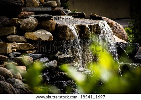 flowing water over river rocks