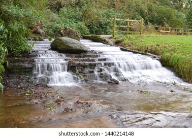 Flowing waterfall at Newstead Abbey, England, United Kingdom.