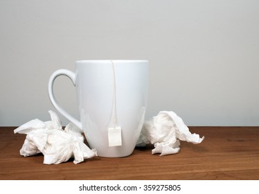 Flu And Cold Theme With Mug Of Tea And Tissues