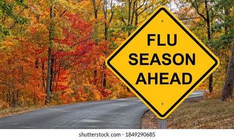 Flu Season Ahead Caution Sign - Autumn Background