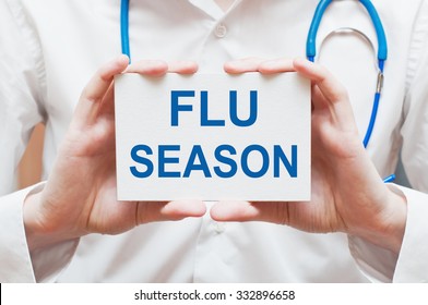 Flu Season Card In Hands Of Medical Doctor