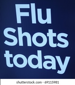 Flu Shots Today Sign Posted Outside.