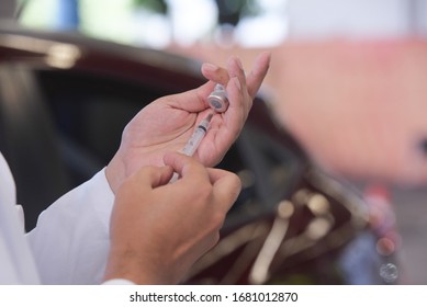 Flu Vaccination In Elderly People Using The Drive Thru System Receive The Vaccine Inside The Car To Prevent Crowding Due To The Coronavirus, Covid19