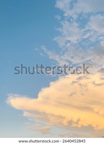 Fluffly clouds in a blue sky