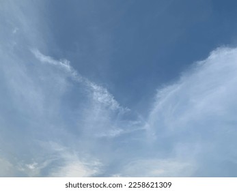 Fluffy cirrus clouds like butterflies spreading their wings. It is soft and beautiful in the morning in Bangkok, Thailand.no focus - Shutterstock ID 2258621309