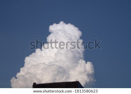 Fluffy Clouds in blue sky