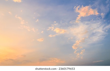 Fluffy Clouds in a Bright Blue Sky: Peaceful and Calm Nature