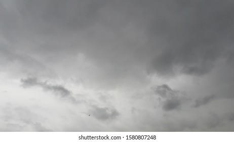 fluffy dark clouds in sky