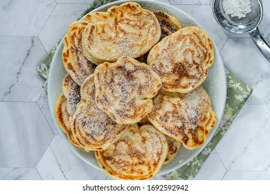 Fluffy Homemade Pancakes With Apple Dusted With Icing Sugar - Overhead View