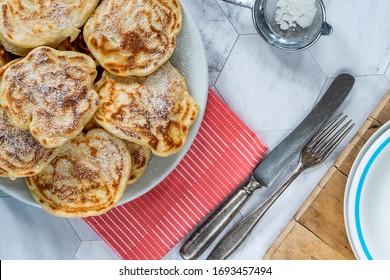 Fluffy Homemade Pancakes With Apple Dusted With Icing Sugar - Overhead View