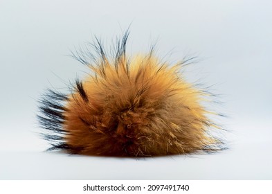 Fluffy lump, fluff in the center of the frame, fur toy, fluffy red fur, place for text, unusual background, piece of fur, fox fur 
