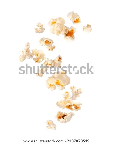 Fluffy popcorn scattered in the air isolated on a white background