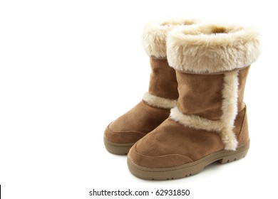 Fluffy woolly warm boots isolated over white