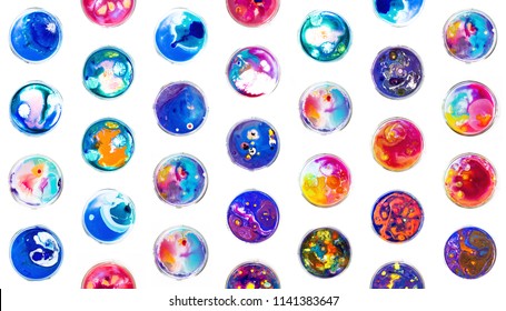 Fluid Art In A Petri Dish. Colorful Acrylic, Ink, Oil And Watercolor Marble Paint Splashes. Abstract Fluid Ocean Of Color Or Alien Planet Of Liquid Color.  Living Colorful Bacteria In A Petri Dish.