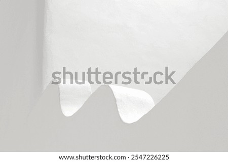 Fluid and curvaceous forms. White abstract arquitecture background. Simple architectural design and shapes. Exterior soft white wall details. Dynamic style concept. Pantone 11 4201, Cloud dancer 2026