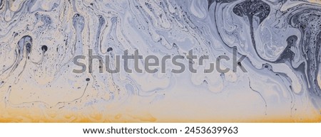Fluid soap bubble psychedelic colorful abstract art. Surreal patterns with rainbows and waves of color in motion.