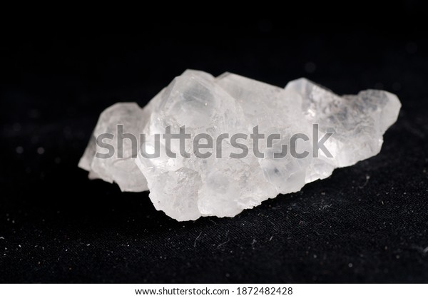 fluorite, white crystal mineral sample of a\
gemstone with quartz