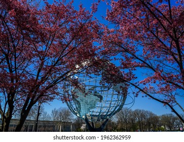 FLUSHING, NEW YORK - APRIL 8, 2021: 1964 New York World's Fair Unisphere in Flushing Meadows Park. It is the world's largest global structure, rising 140 feet and weighing 700 000 pounds