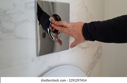 Flushing Water Using Dual Machanism OF Concealed Toilet Cistern