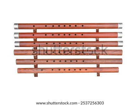 Flute pipe Solid wood flute, round tube, polished surface, placed on a stand isolated on white background. This has clipping path.
