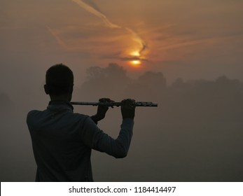 Flute Player And The Sunrise