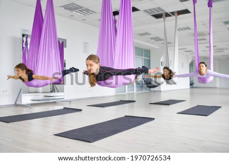 Fly antigravity yoga, training with hammocks