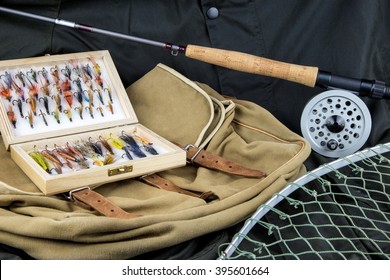 Fly Fishing Tackle With Bag And Net On Outdoor Coat