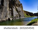 Fly fishing for trout on the Middle Fork of the Boise River, Idaho 
