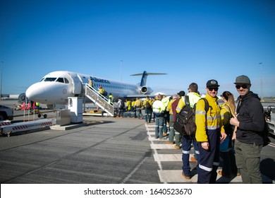 Fly In Fly Out Construction Site Miner Workers Queuing Up For Departure At Terminal 2 Perth Airport For Iron Ore  2 Weeks Shutdown Operation In Pilbara Region 20/Jan/2020 Perth Western Australia   