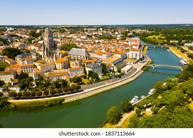 Fly over the picturesque town of Saintes and Saint Peters Basilica. France