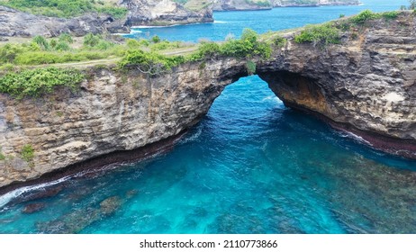 Fly Over Rock Arch Over Ocean In Broken Beach, Nusa Penida, Indonesia. High Quality 4k Footage