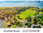 Fly over, view Governors Island National Monument near New York and Manhattan from a bird