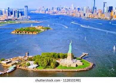 Fly over, view Statue of Liberty (Liberty Enlightening the world) near New York and Manhattan from a bird's eye view.