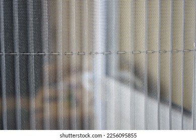 fly screen knitted with thin wire, view out of the mosquito net,