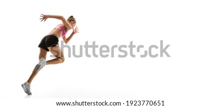 Flyer. Caucasian professional female athlete, runner training isolated on white studio background. Muscular, sportive woman. Concept of action, motion, youth, healthy lifestyle. Copyspace for ad.