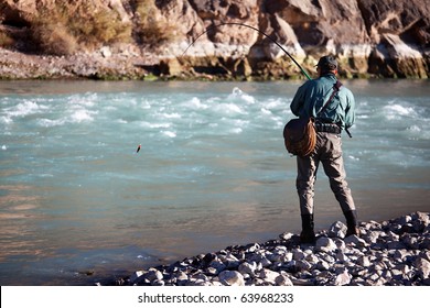 Fly-fishing on mountain river