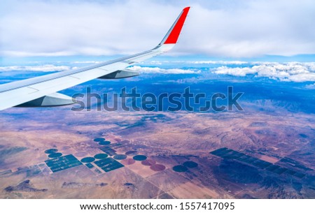 Flying above circular and rectangular fields in Arizona, United States
