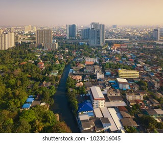 Flying Above Phasi Charoen Canal In Bangkok City, Thailand.