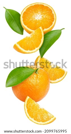 Flying in air Orange fruit with leaves isolate. Orange on white. Orange clipping path.
