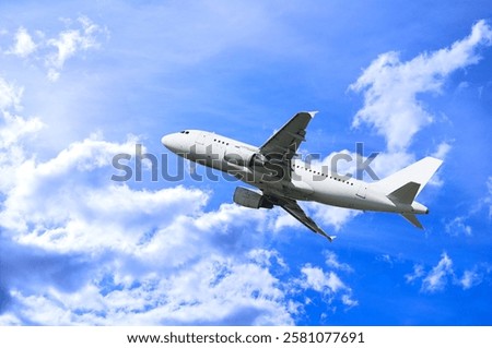 Flying airplane in the sky, summer travel background with airplane flying among fluffy clouds, flying plane in the sky, panoramic air travel scene