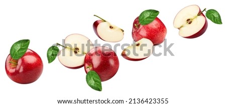 Flying apple isolated on white background. Levitation red apple with leaves. Clipping path apple. Apple macro studio photo