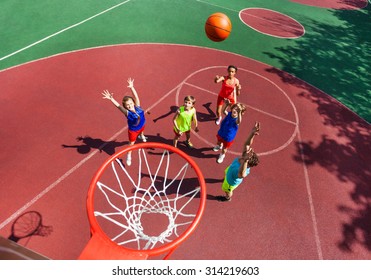 Flying Ball To Basket Top View During Basketball