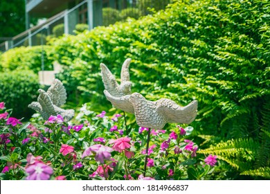 Flying Birds Sculpture In The Garden