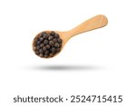 Flying black pepper or peppercorns in wooden spoon isolated on white background , clipping path.